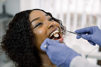 A young patient is seen by a Dental Hygienist prior to the dentist.